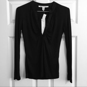 NWT! DIANE VON FURSTENBERG Black LS Top! Size “P”